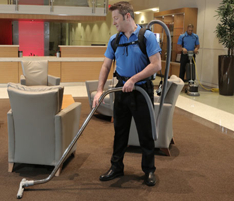 person cleaning in a business