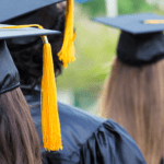 Higher education students wearing mortarboards