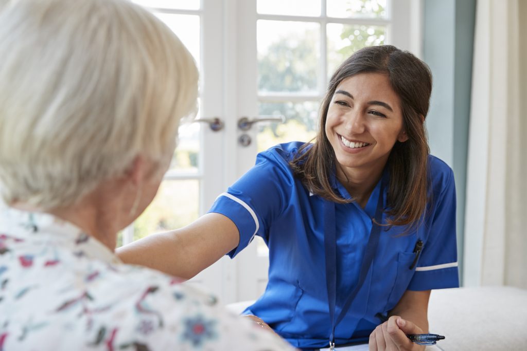 healthcare employee caring for patient