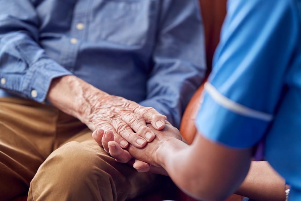 elderly person with care worker