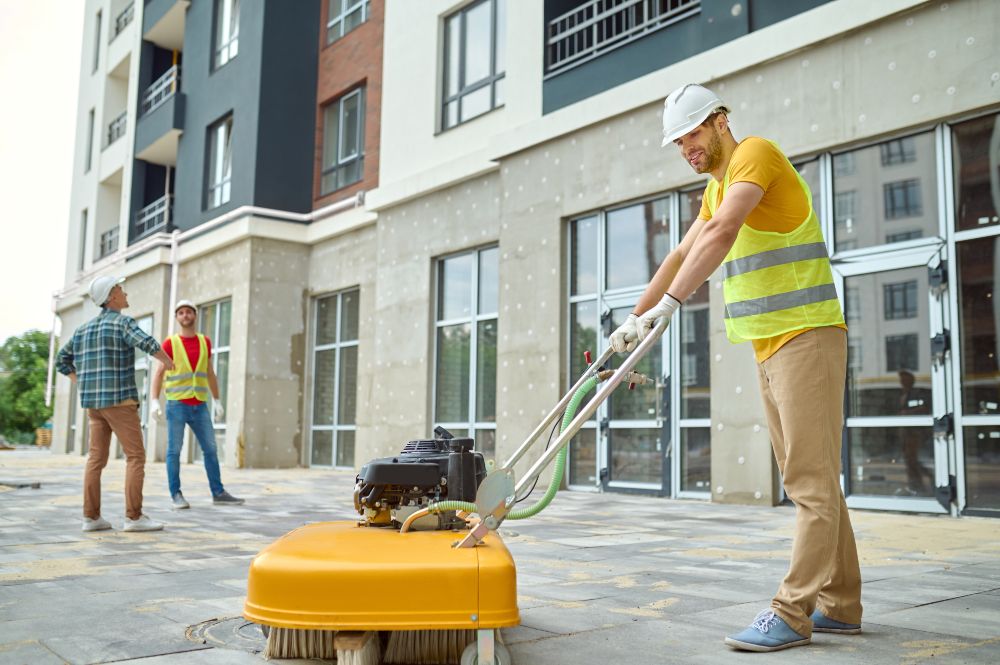 Jani King employee cleaning post construction workplace